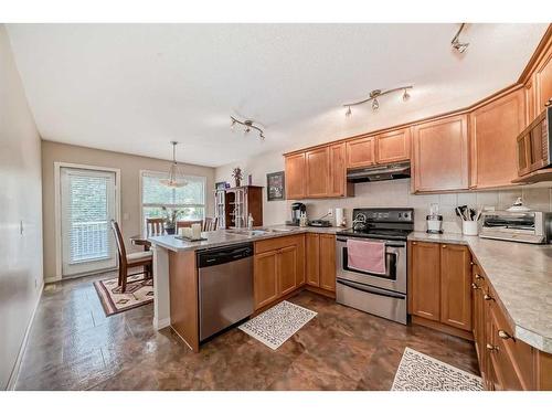 350 Ranch Ridge Court, Strathmore, AB - Indoor Photo Showing Kitchen With Double Sink