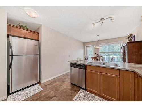 350 Ranch Ridge Court, Strathmore, AB - Indoor Photo Showing Kitchen With Double Sink