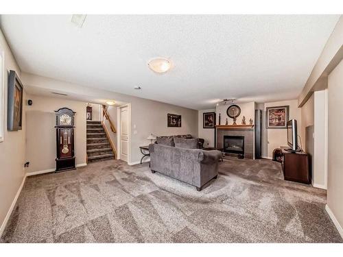 350 Ranch Ridge Court, Strathmore, AB - Indoor With Fireplace