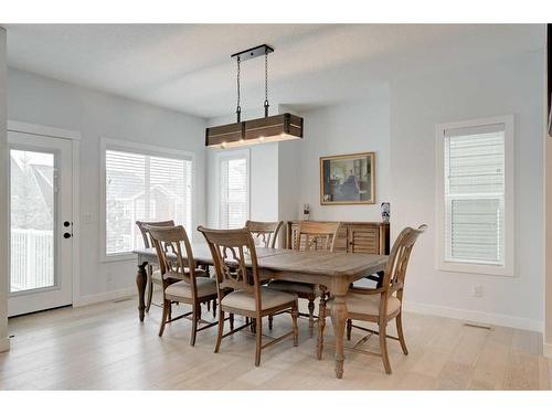 99 Ridge View Close, Cochrane, AB - Indoor Photo Showing Dining Room