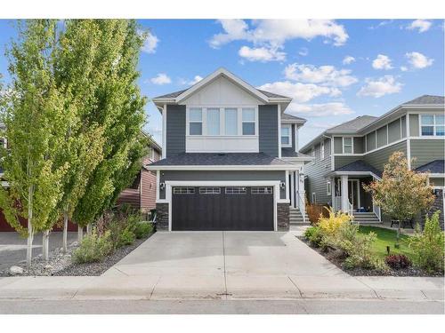 99 Ridge View Close, Cochrane, AB - Outdoor With Facade