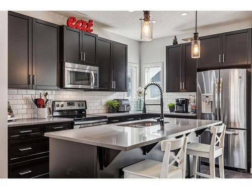 232 Copperpond Parade Se, Calgary, AB - Indoor Photo Showing Kitchen With Double Sink With Upgraded Kitchen