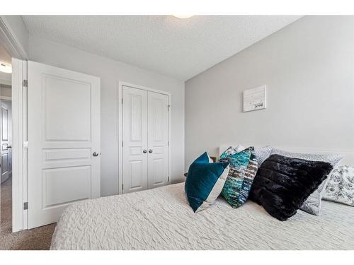 232 Copperpond Parade Se, Calgary, AB - Indoor Photo Showing Bedroom