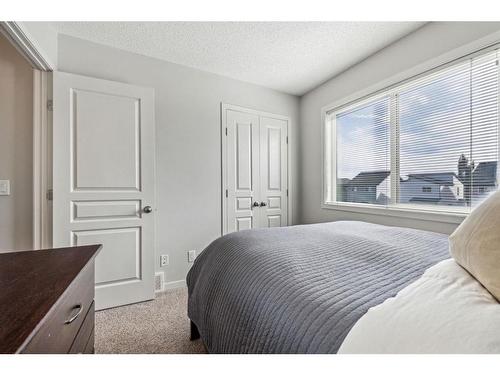 232 Copperpond Parade Se, Calgary, AB - Indoor Photo Showing Bedroom