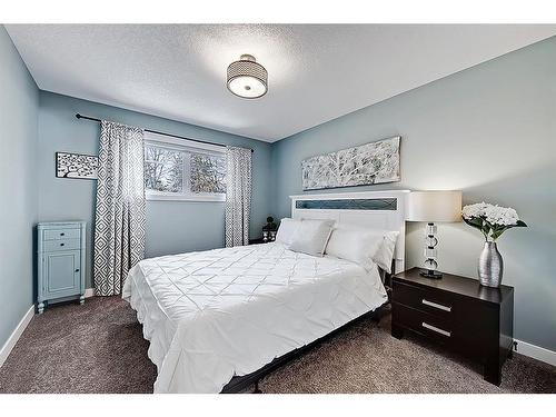 5907 Lockinvar Road Sw, Calgary, AB - Indoor Photo Showing Bedroom