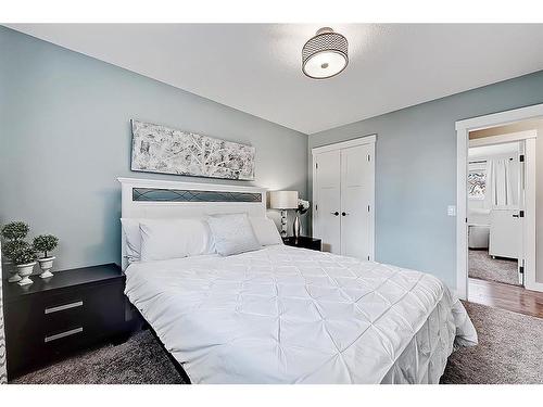 5907 Lockinvar Road Sw, Calgary, AB - Indoor Photo Showing Bedroom