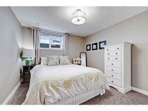 5907 Lockinvar Road Sw, Calgary, AB - Indoor Photo Showing Bedroom