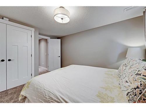 5907 Lockinvar Road Sw, Calgary, AB - Indoor Photo Showing Bedroom