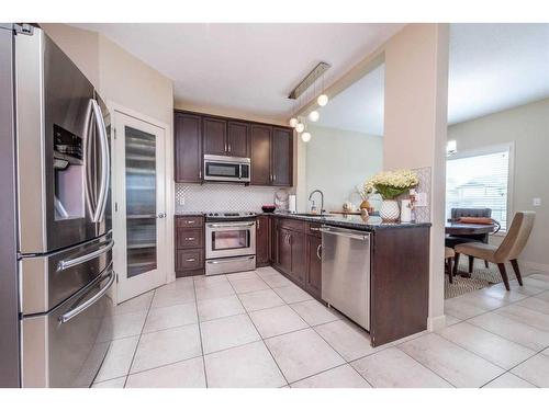 124 Everhollow Street Sw, Calgary, AB - Indoor Photo Showing Kitchen With Stainless Steel Kitchen