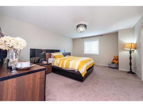 124 Everhollow Street Sw, Calgary, AB - Indoor Photo Showing Bedroom