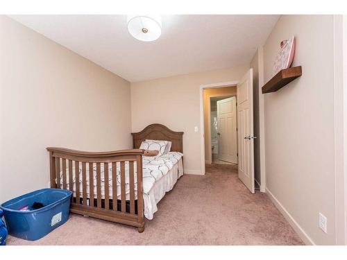 124 Everhollow Street Sw, Calgary, AB - Indoor Photo Showing Bedroom