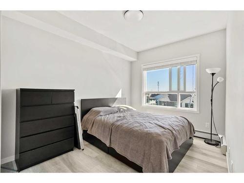 303-100 Harvest Hills Place Ne, Calgary, AB - Indoor Photo Showing Bedroom