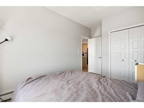 303-100 Harvest Hills Place Ne, Calgary, AB - Indoor Photo Showing Bedroom