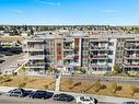 303-100 Harvest Hills Place Ne, Calgary, AB  - Outdoor With Balcony With View 