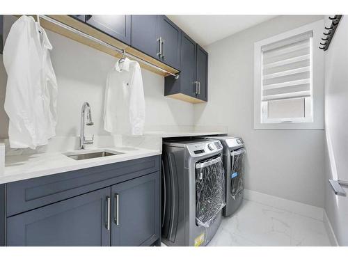 90 Trinity Road, Rural Rocky View County, AB - Indoor Photo Showing Laundry Room