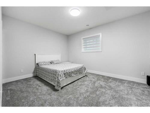 90 Trinity Road, Rural Rocky View County, AB - Indoor Photo Showing Bedroom