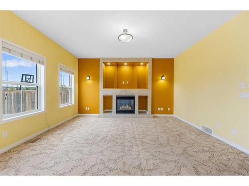 277 Martin Crossing Place Ne, Calgary, AB - Indoor With Fireplace