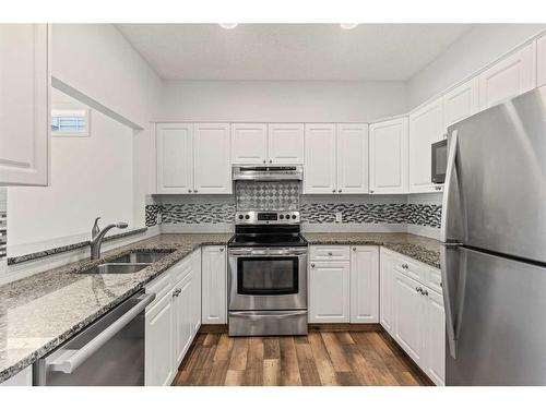 2906 23 Avenue Sw, Calgary, AB - Indoor Photo Showing Kitchen With Stainless Steel Kitchen With Double Sink With Upgraded Kitchen