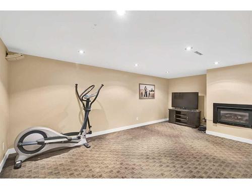 20 Hallmark Place Sw, Calgary, AB - Indoor With Fireplace