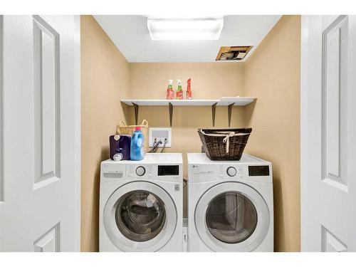 20 Hallmark Place Sw, Calgary, AB - Indoor Photo Showing Laundry Room