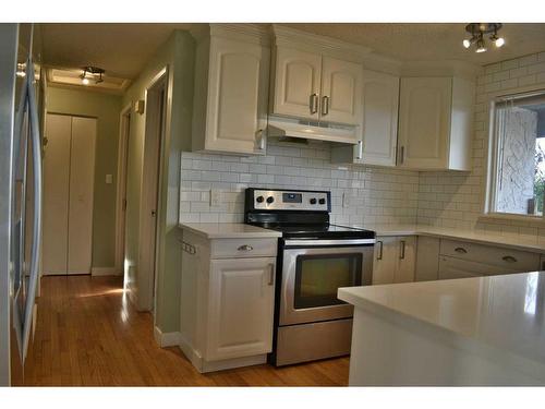 1165 Hunterston Hill Nw, Calgary, AB - Indoor Photo Showing Kitchen With Stainless Steel Kitchen With Upgraded Kitchen