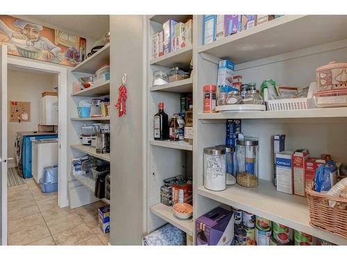 16 Sunset Close, Cochrane, AB - Indoor With Storage