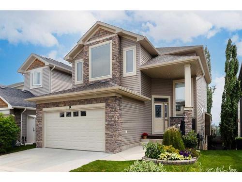 16 Sunset Close, Cochrane, AB - Outdoor With Facade