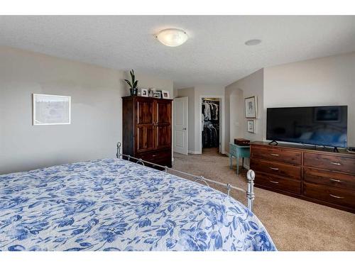 16 Sunset Close, Cochrane, AB - Indoor Photo Showing Bedroom