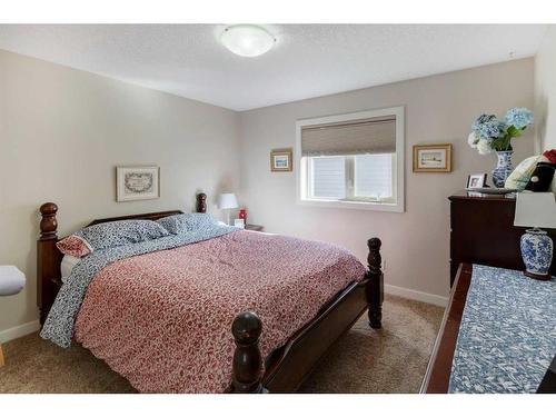 16 Sunset Close, Cochrane, AB - Indoor Photo Showing Bedroom