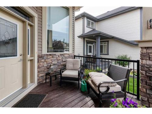 16 Sunset Close, Cochrane, AB - Outdoor With Deck Patio Veranda With Exterior