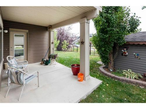 16 Sunset Close, Cochrane, AB - Outdoor With Deck Patio Veranda With Exterior