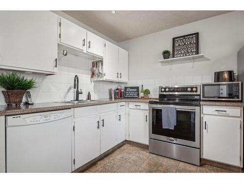 96 Millcrest Way Sw, Calgary, AB - Indoor Photo Showing Kitchen