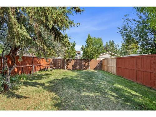 96 Millcrest Way Sw, Calgary, AB - Outdoor With Backyard