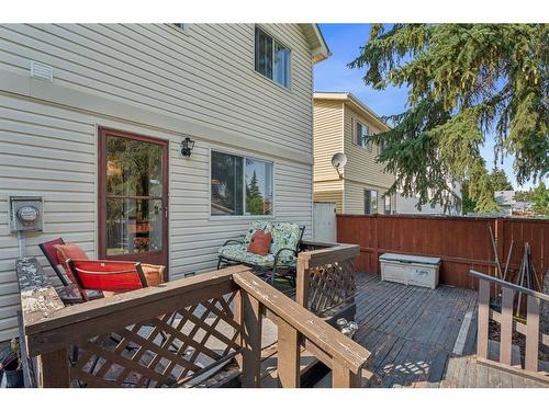 96 Millcrest Way Sw, Calgary, AB - Outdoor With Deck Patio Veranda With Exterior