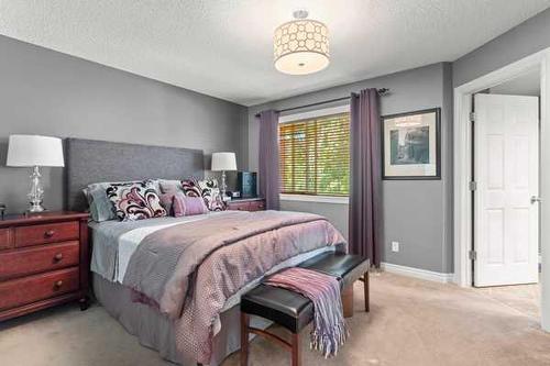 15 Tuscany Hill Nw, Calgary, AB - Indoor Photo Showing Bedroom