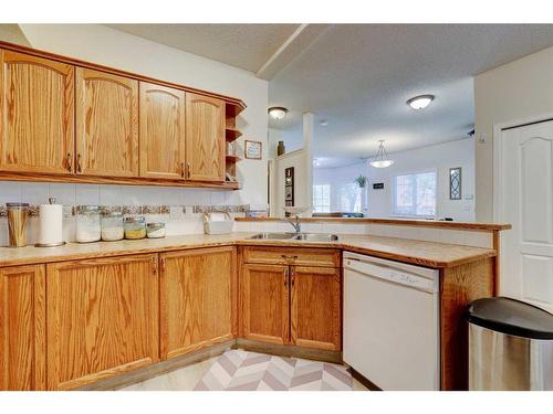 152-1415 Centre A Street Ne, Calgary, AB - Indoor Photo Showing Kitchen With Double Sink