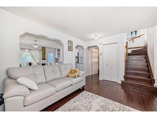 7281 Laguna Way Ne, Calgary, AB - Indoor Photo Showing Living Room