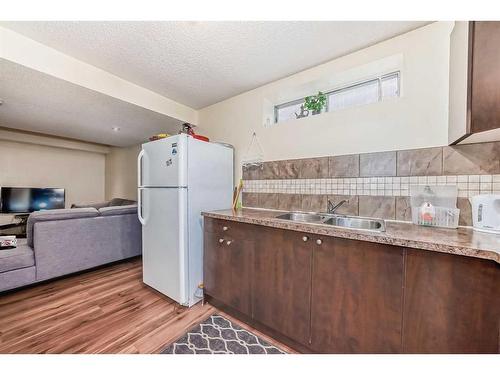 7281 Laguna Way Ne, Calgary, AB - Indoor Photo Showing Kitchen With Double Sink