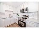 1003-1334 13 Avenue Sw, Calgary, AB  - Indoor Photo Showing Kitchen With Double Sink 