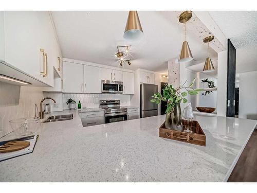 1003-1334 13 Avenue Sw, Calgary, AB - Indoor Photo Showing Kitchen With Stainless Steel Kitchen With Double Sink With Upgraded Kitchen