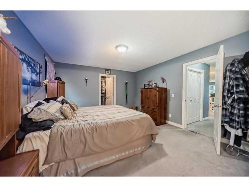 112 Oakmere Place, Chestermere, AB - Indoor Photo Showing Bedroom