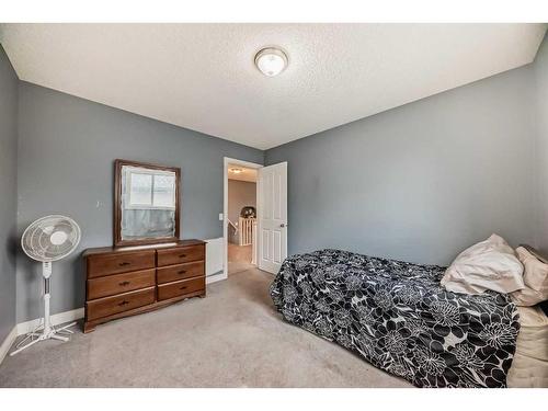 112 Oakmere Place, Chestermere, AB - Indoor Photo Showing Bedroom