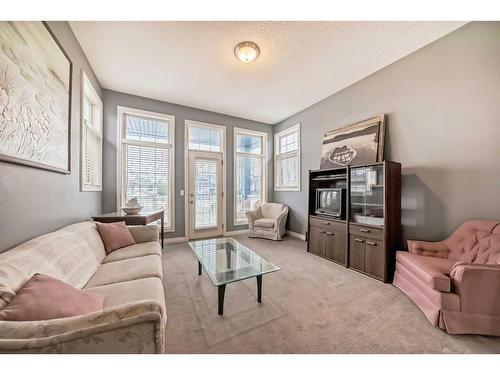 112 Oakmere Place, Chestermere, AB - Indoor Photo Showing Living Room