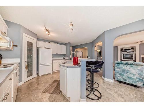 112 Oakmere Place, Chestermere, AB - Indoor Photo Showing Kitchen With Double Sink