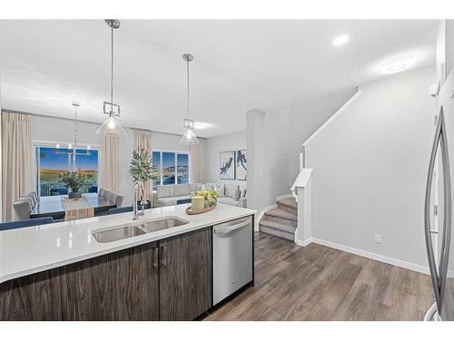 158 Carringvue Park Nw, Calgary, AB - Indoor Photo Showing Kitchen With Double Sink