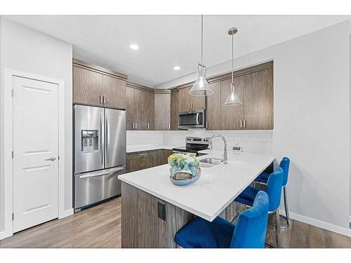 158 Carringvue Park Nw, Calgary, AB - Indoor Photo Showing Kitchen With Upgraded Kitchen