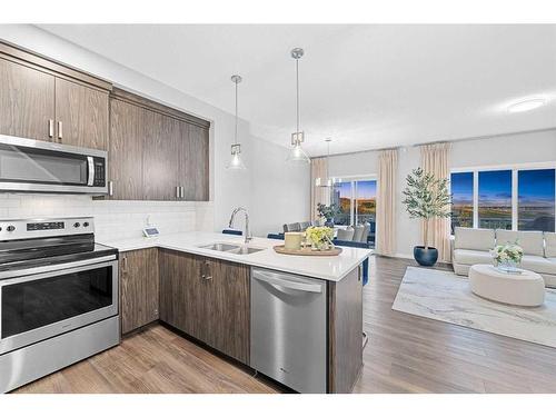 158 Carringvue Park Nw, Calgary, AB - Indoor Photo Showing Kitchen With Double Sink With Upgraded Kitchen