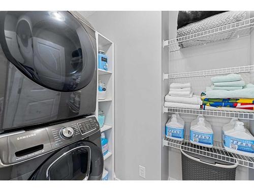 158 Carringvue Park Nw, Calgary, AB - Indoor Photo Showing Laundry Room