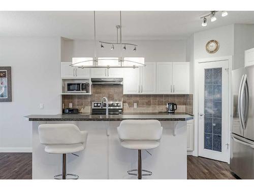 103 Bridle Estates Mews Sw, Calgary, AB - Indoor Photo Showing Kitchen With Stainless Steel Kitchen With Upgraded Kitchen