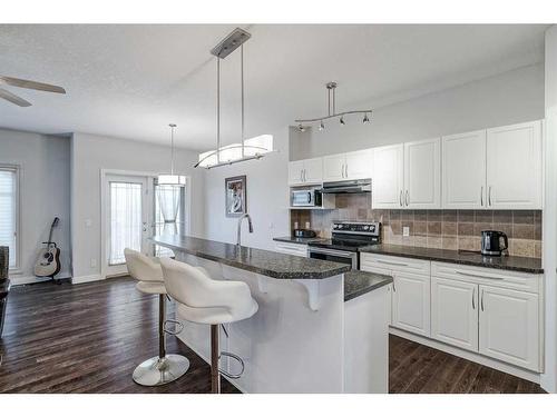 103 Bridle Estates Mews Sw, Calgary, AB - Indoor Photo Showing Kitchen With Upgraded Kitchen